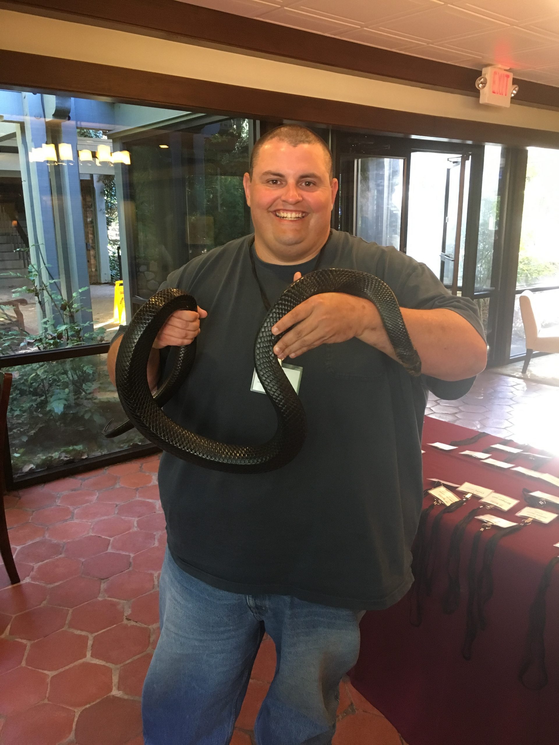 Kevin with an eastern indigo snake